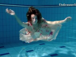 Russian lover Edwiga swims nude in the pool in Russia
